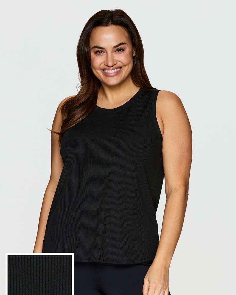 Front of a model wearing a size 1X Everyday Ribbed Tank in Black by RBX Active. | dia_product_style_image_id:244687